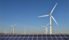 Wind turbines and solar panels.